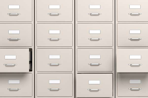 File cabinets with a few drawers open