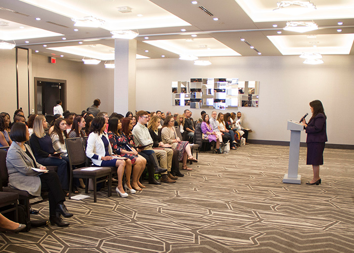 audience at the health sciences pinning ceremony