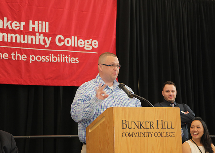 student speaking at podium