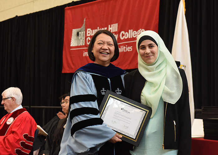 Pam Eddinger giving a student her award