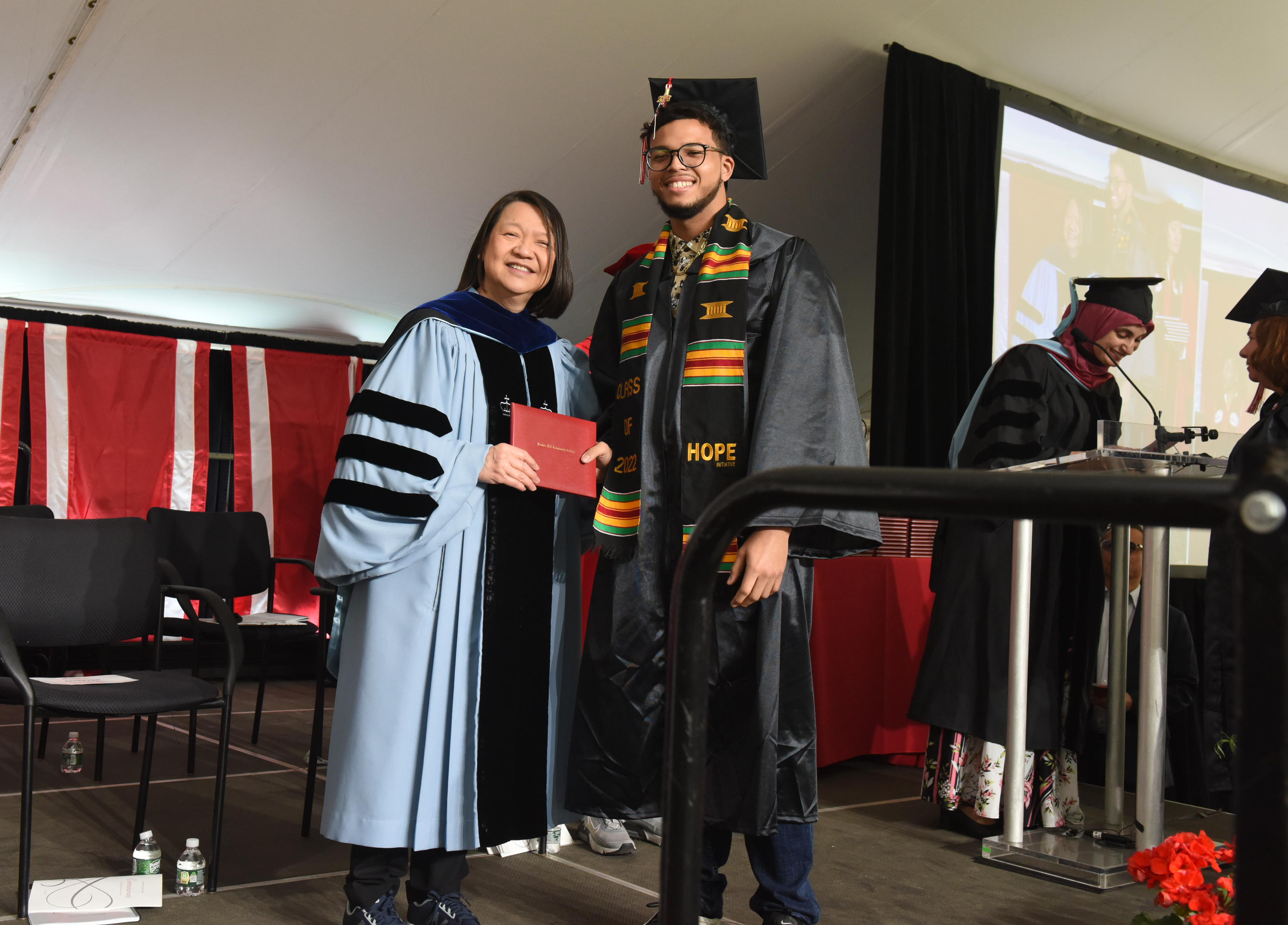 President Eddinger posing with student