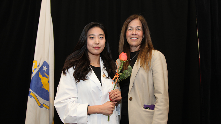 Nursing students posing with BHCC staff member