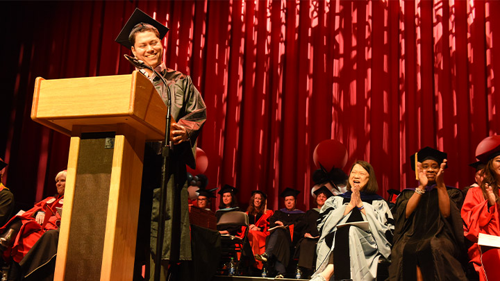 student speaker at podium