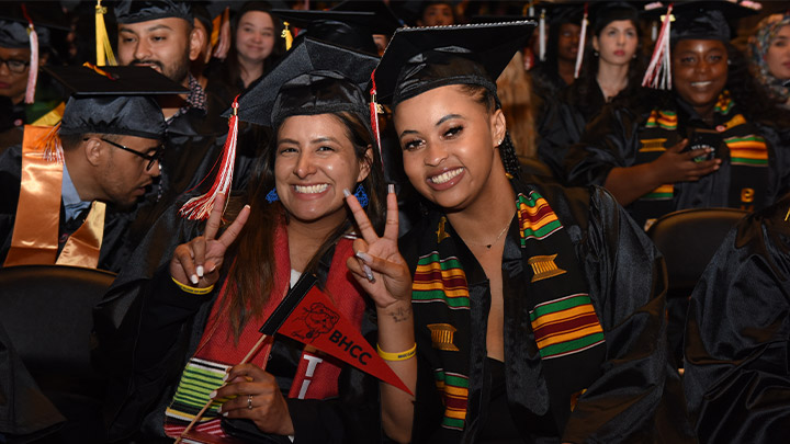 graduates posing