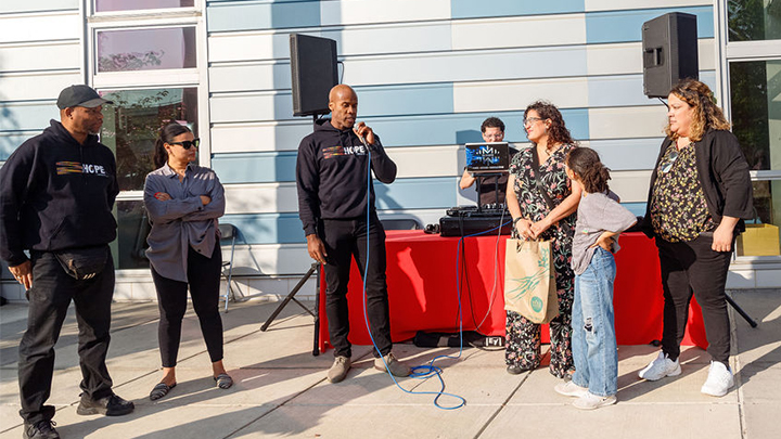 Evans speaking at the event