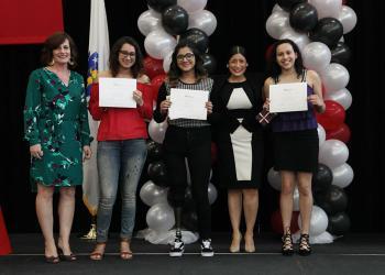 dual enrollment students posing with their certificates