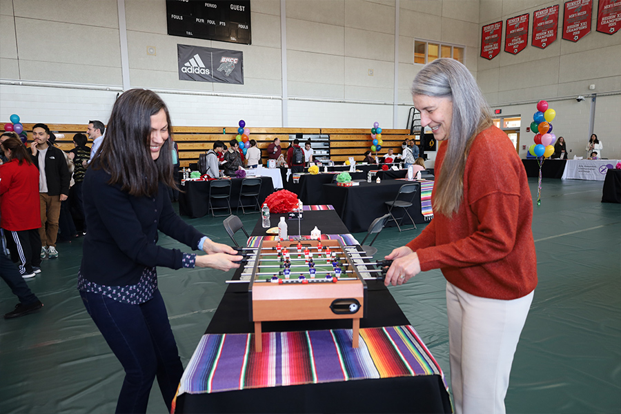 women playing foosball