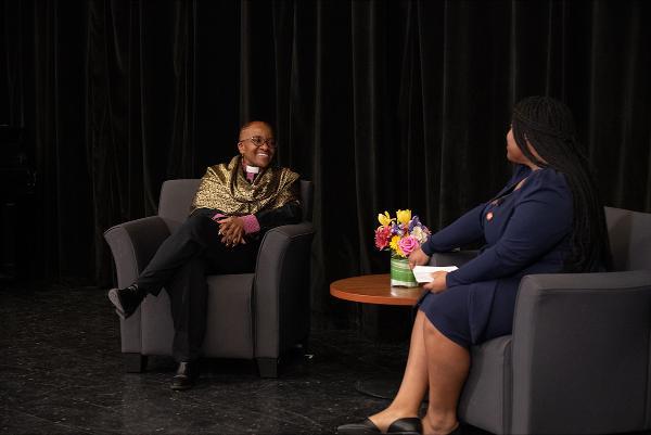 Rev Tutu on stage being interviewed