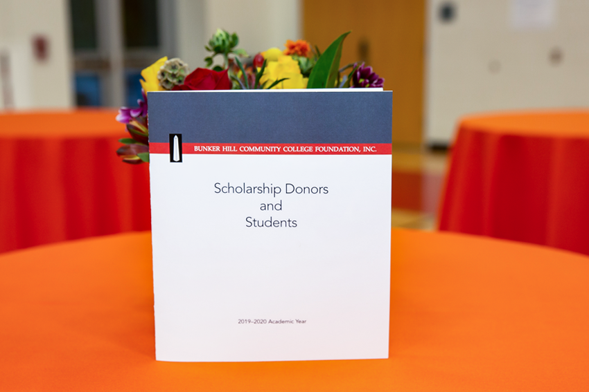 Scholarship Dinner Table with program and flowers