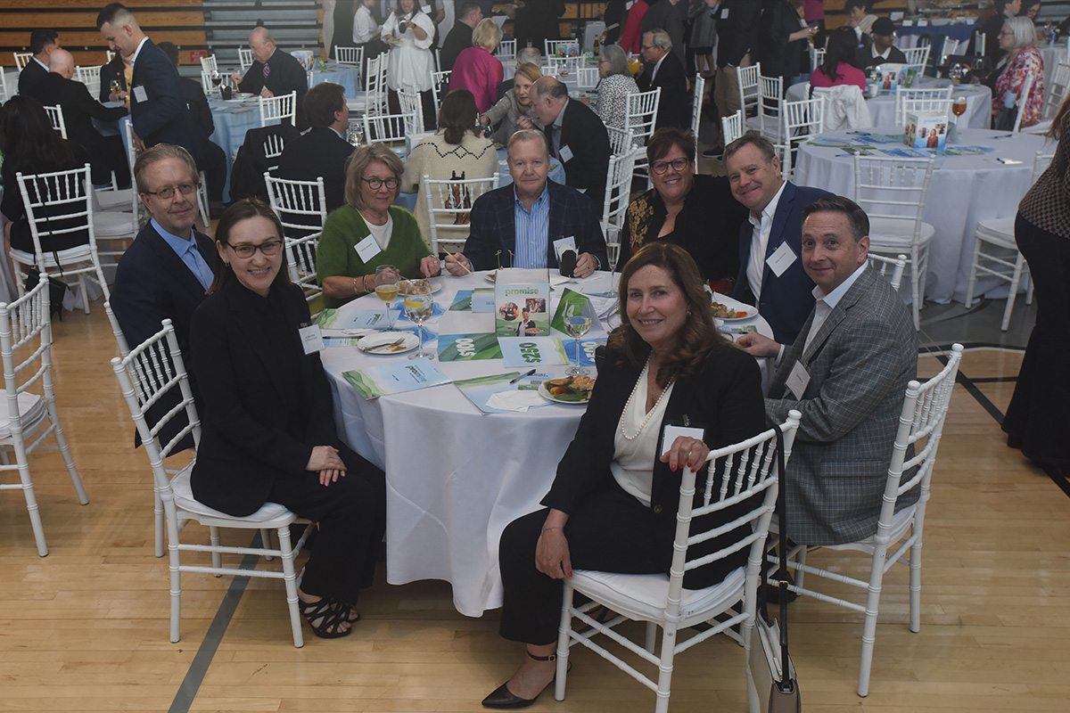 attendees sitting at a table
