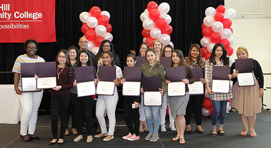 Students with their certificates