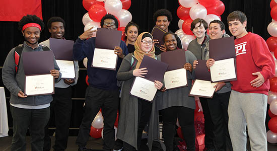 Students posing with their certificates