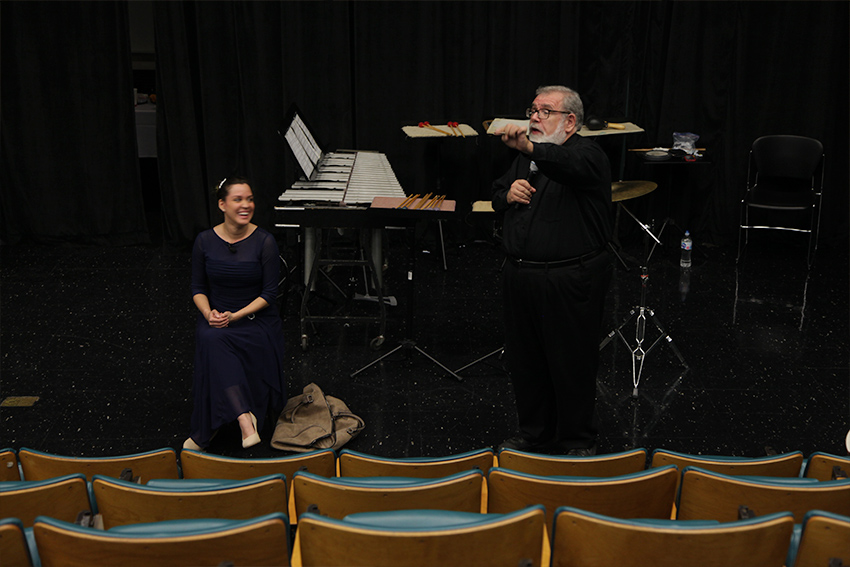 man and woman performing on stage