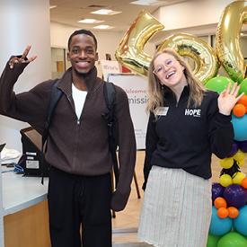 Student Jonathan Lubin and HOPE Initiative Access Navigator Ahnastasia Kielar celebrate the College’s Birthday Week in September.