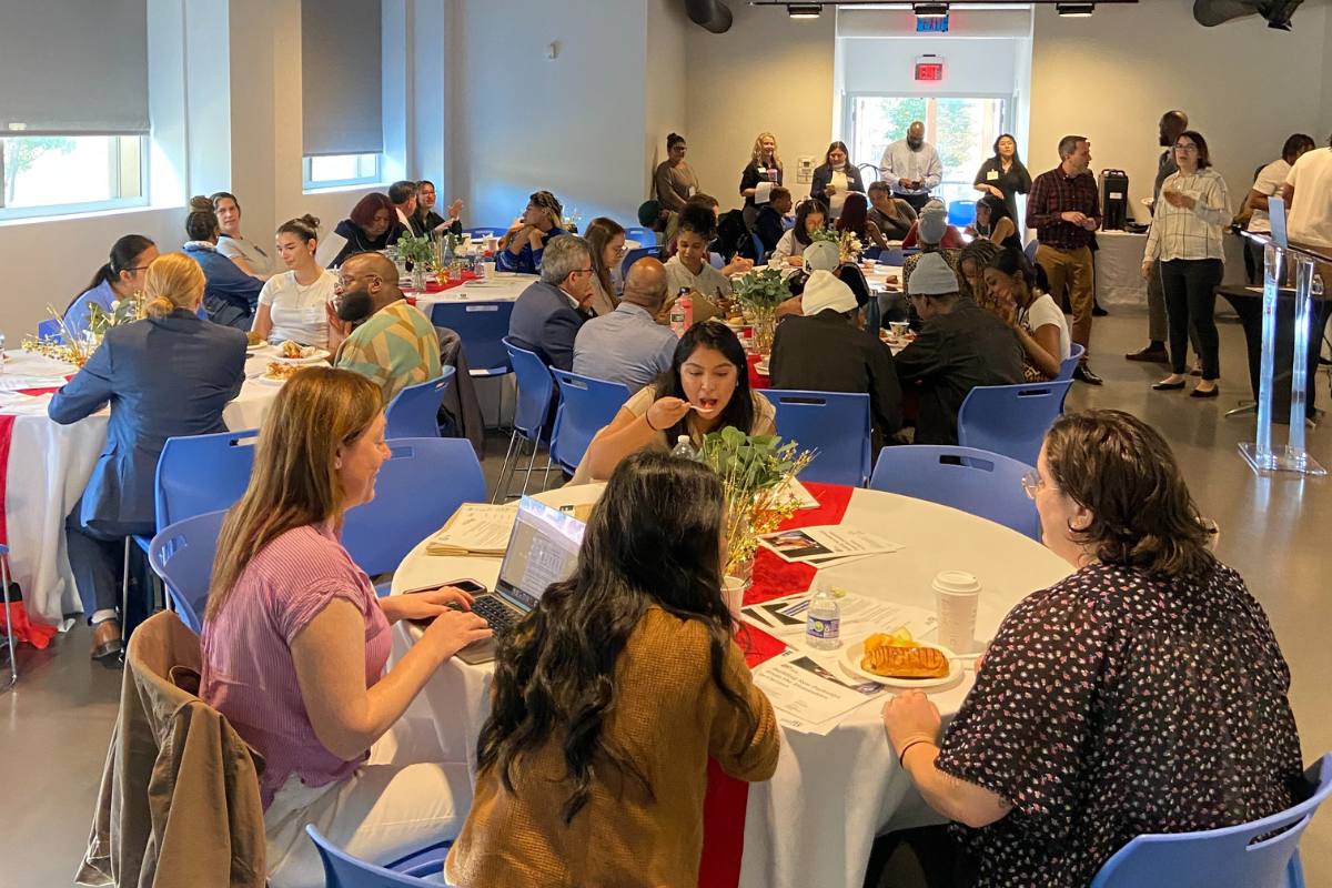 Admission Breakfast attendees eating breakfast