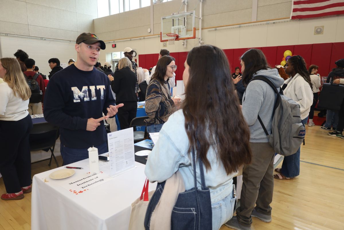College rep speaking to a student