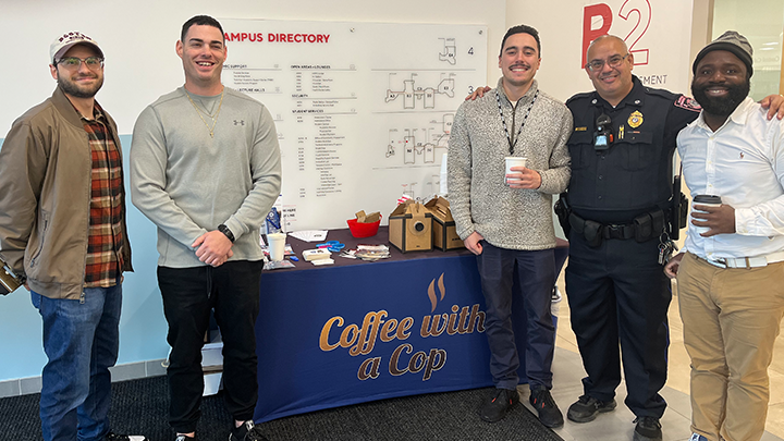 People posing at Coffee with a cop event