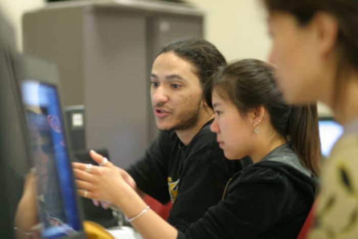 students with a computer