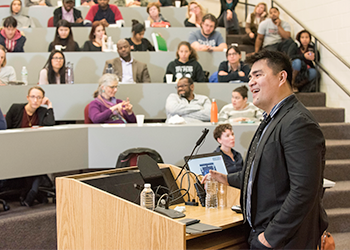 Jose Vargas speaking to the audience at the podium