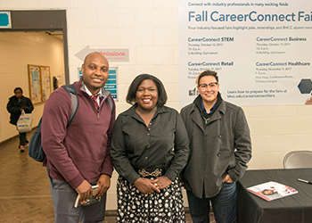 Shoshana Johnson poses with two BHCC students 