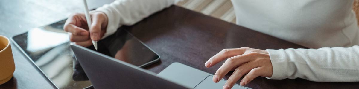 Hands on a laptop